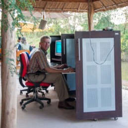 Eric in an internet café in Chiang Rai, Thailand