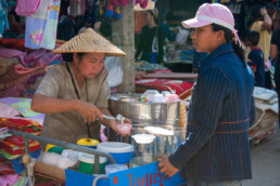 Old woman in food stall