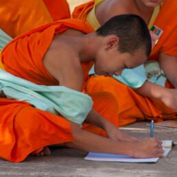 Writing young monk