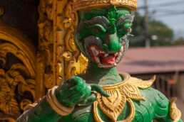 temple figure in green